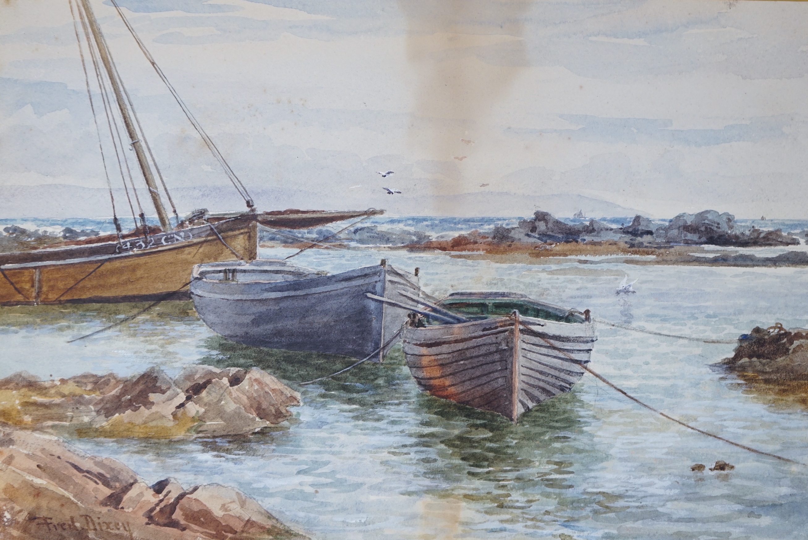 Frederick Charles Dixey (British, fl.1877-1920), watercolour, Fishing boats in harbour, signed, 24 x 36cm, unframed (a.f.)